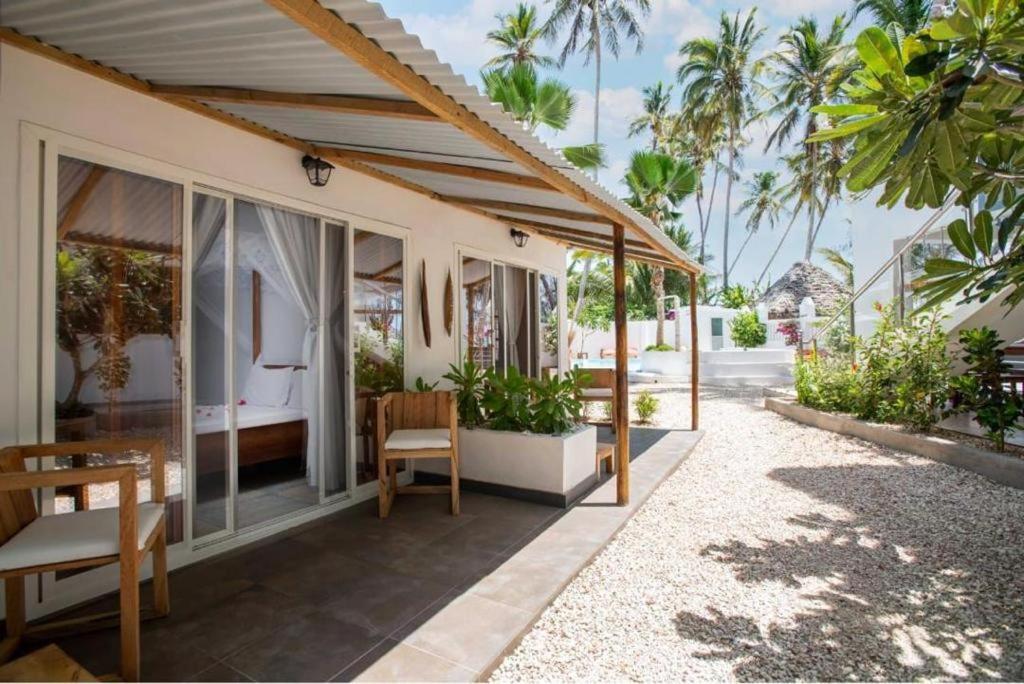 Seashore Beach Hotel كيوينجوا المظهر الخارجي الصورة