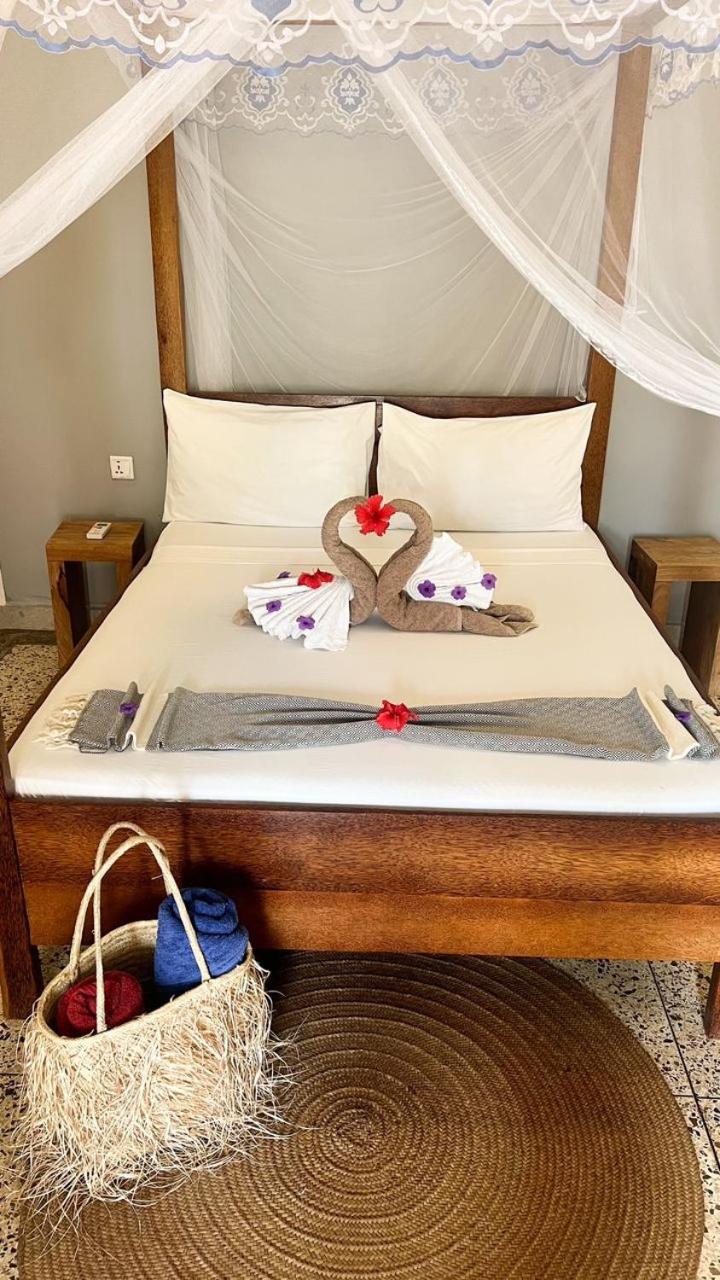 Seashore Beach Hotel كيوينجوا المظهر الخارجي الصورة