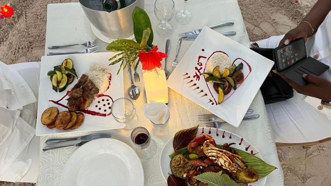 Seashore Beach Hotel كيوينجوا المظهر الخارجي الصورة