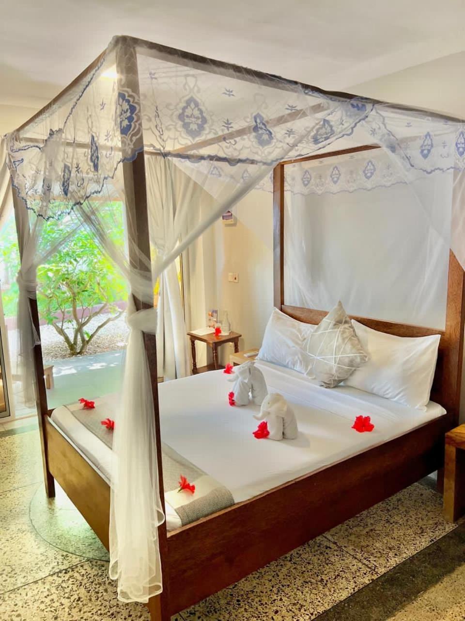 Seashore Beach Hotel كيوينجوا المظهر الخارجي الصورة